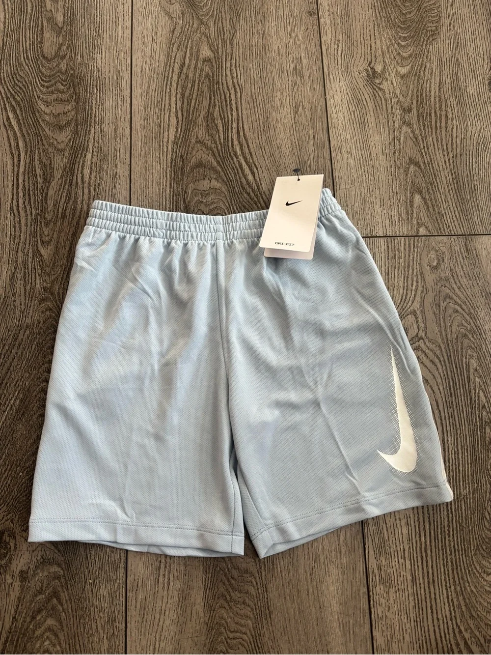 Nike kids Pale Blue Athletic Shorts with White Swoosh
